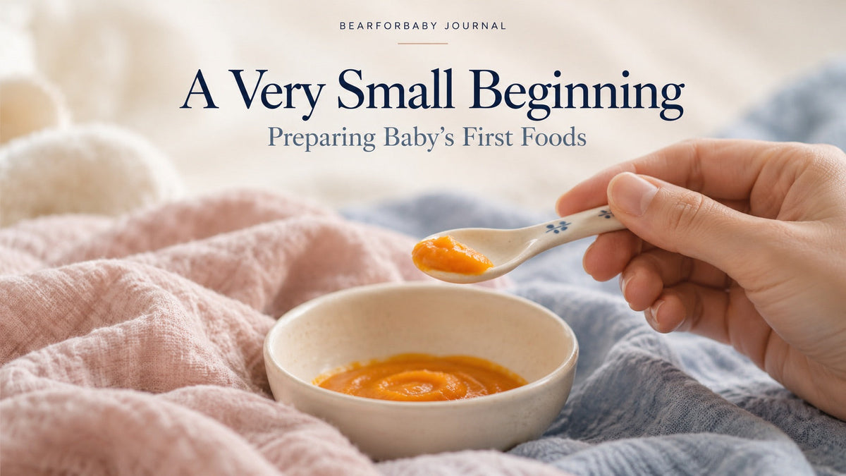 A caregiver holds a small spoonful of puree over a bowl, introducing a baby’s first foods with care.