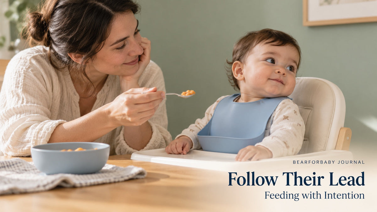 A caregiver responds calmly as a baby turns away from a spoon, illustrating responsive feeding and fullness cues.