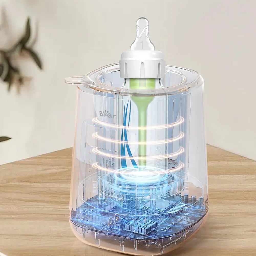 Technical view of Bear Baby Bottle Warmer showing even water bath heating with circular orange thermal rings.