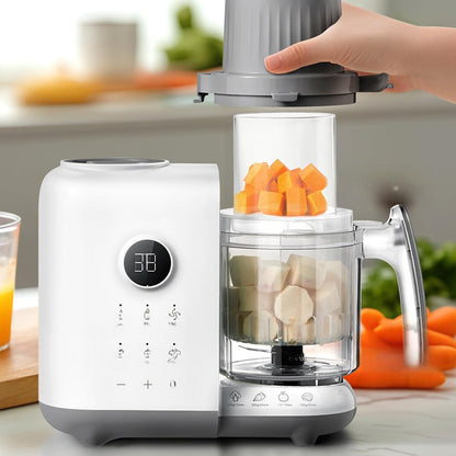 Hand adding diced ingredients into the Bear OneStep Baby Food Processor for healthy meal preparation.