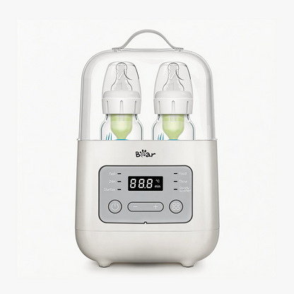 Bear Smart Double Bottle Warmer and Defroster with two baby bottles under a clear protective lid.