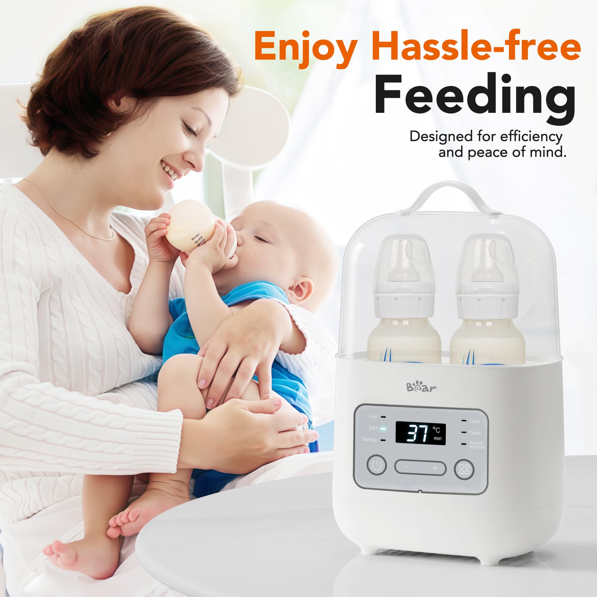 Happy mother feeding her baby next to the white Bear Smart Double Bottle Warmer for hassle-free feeding.