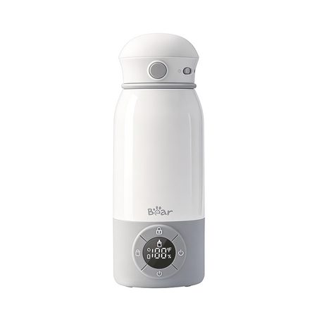 Bear Portable Bottle Warmer for Travel with a digital temperature display showing 100°F and compact white design.